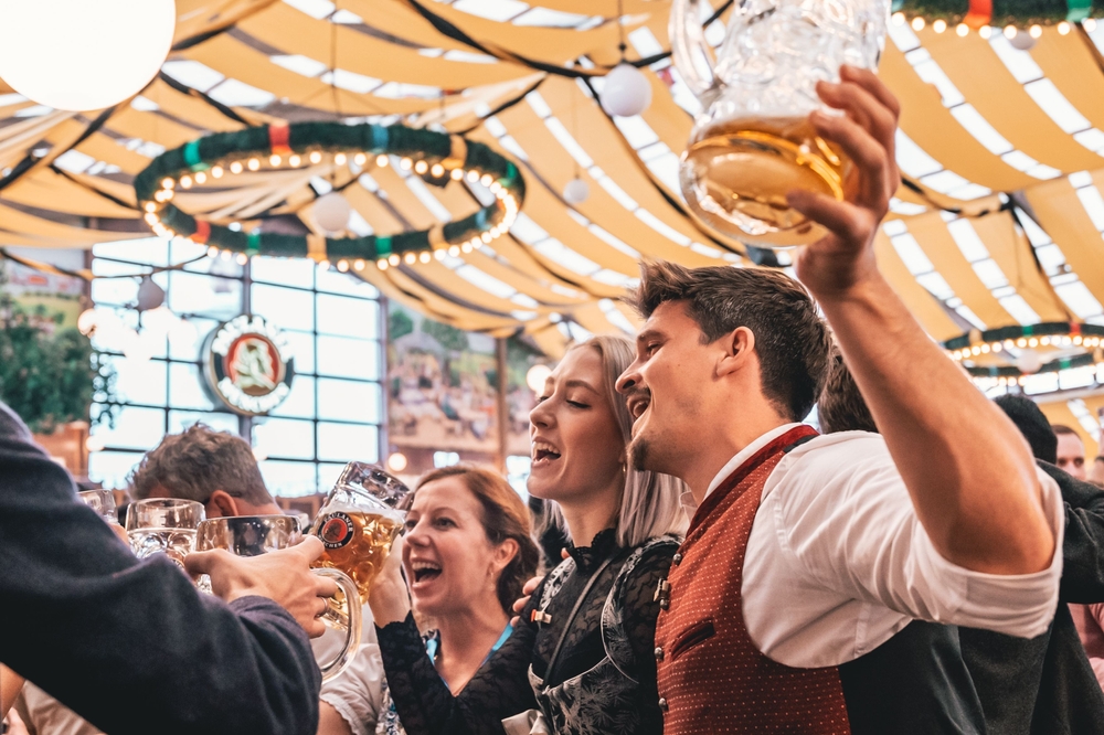 Munich,,Germany, ,Sep,18,,2022:,People,Enjoying,Oktoberfest,In