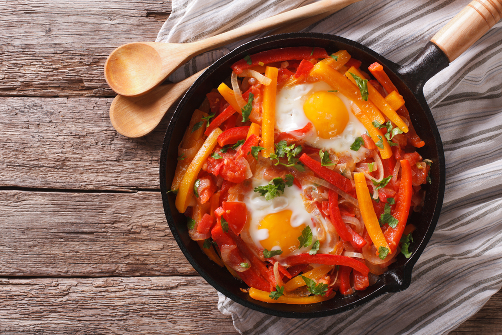 Traditional,Basque,Piperade,With,Eggs,Close up,In,A,Pan ,Horizontal