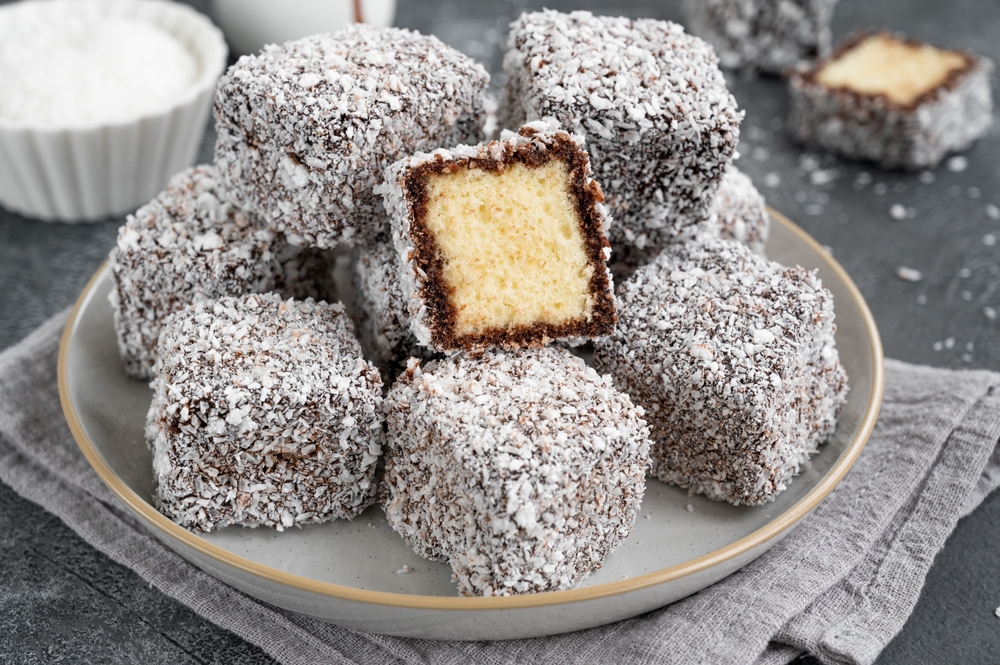 Traditional,Australian,Lamington,Cake,In,Chocolate,Glaze,And,Coconut,Flakes