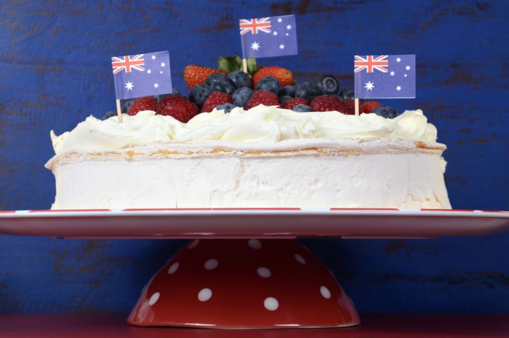 Australian,Traditional,Dessert,,Pavlova,,With,Whipped,Cream,And,Strawberries,,Blueberries