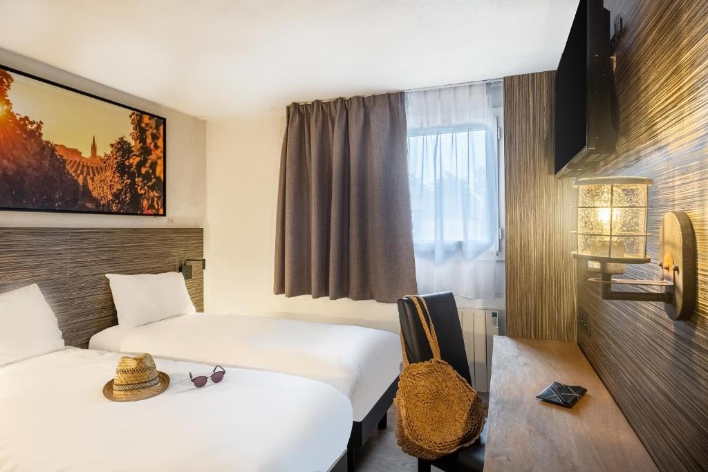 Booking Hôtel Angers Le Village 49 2