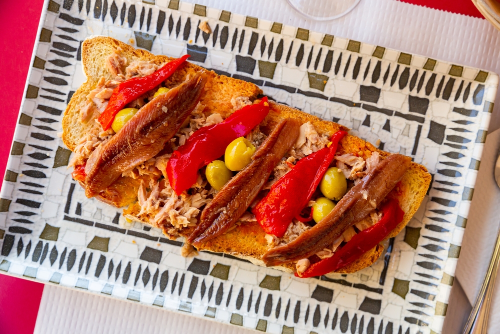 Traditional,Spanish,Snack,Of,Toasted,Bread,With,Chopped,Tuna,,Anchovy