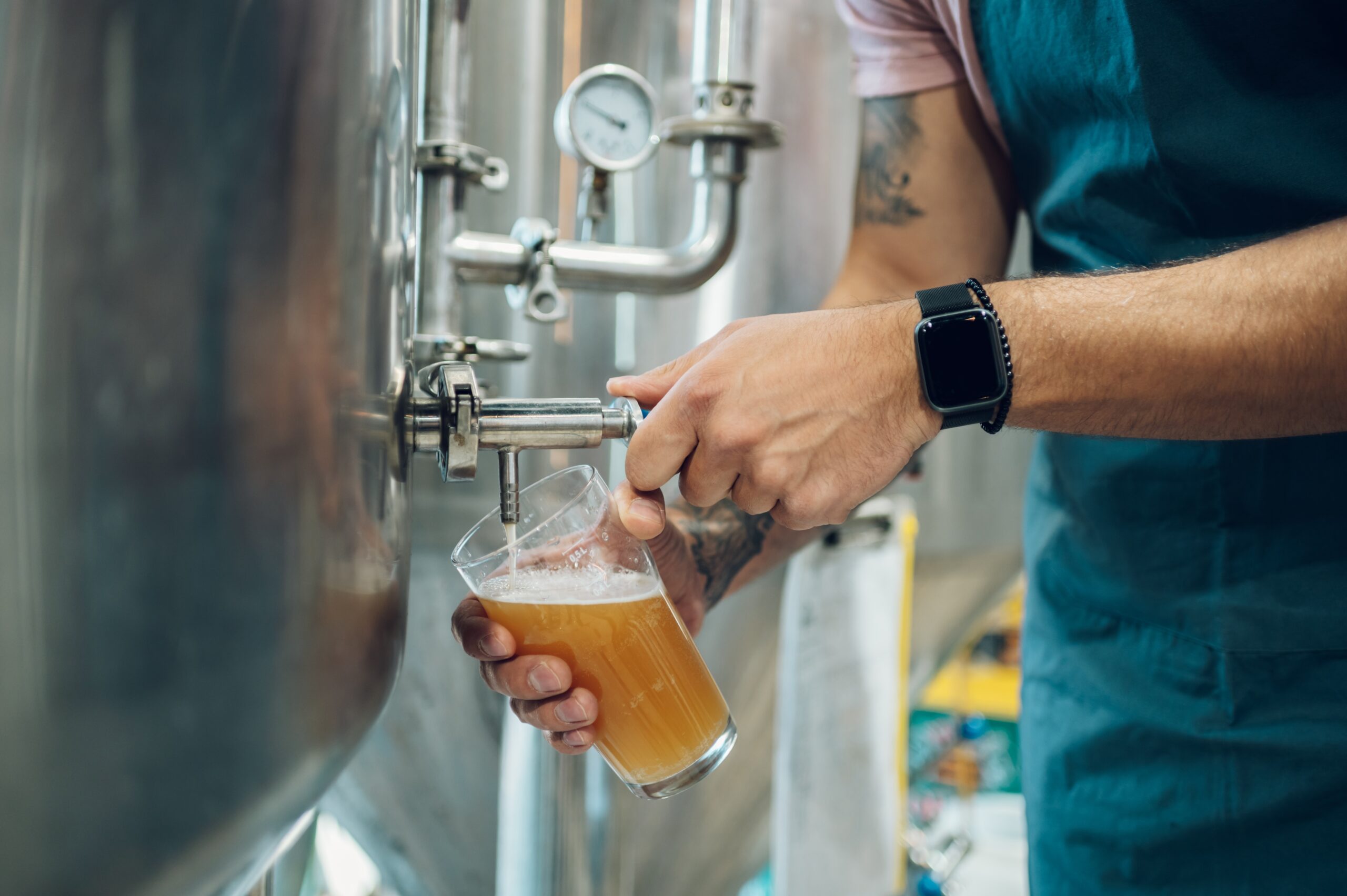 Portrait,Of,A,Bearded,Man,Working,In,A,Brewery,And