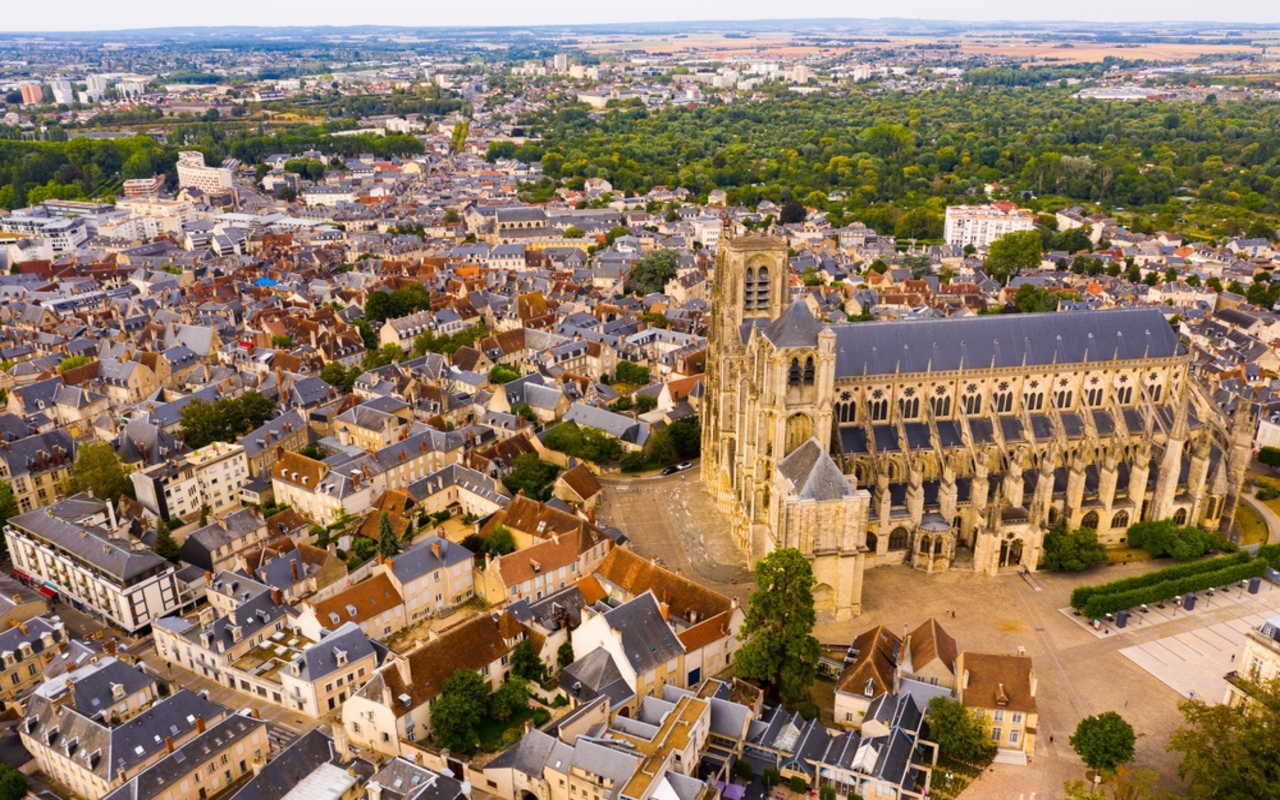 View,From,Drone,Of,Houses,And,Ancient,Roman,Catholic,Cathedral