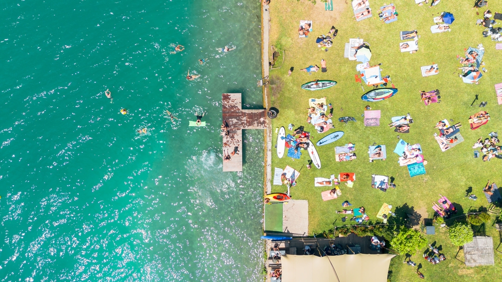 Drone,View,Over,A,Swimming,Area,By,Lake,Annecy