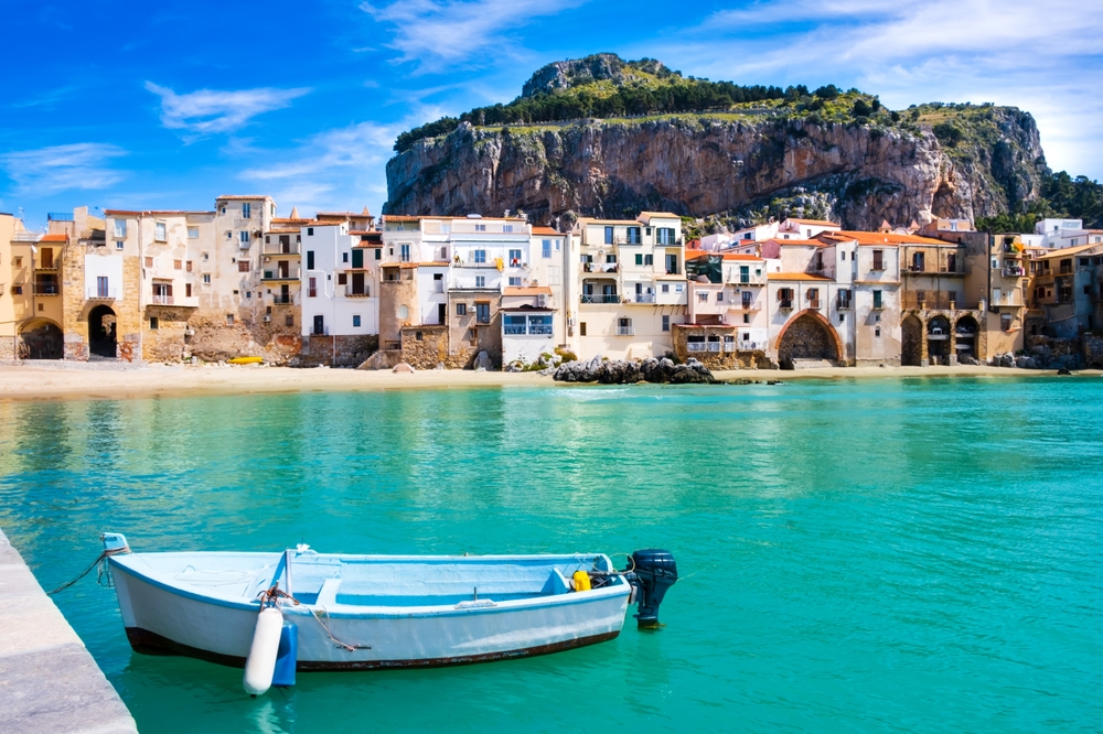 Fishing,Boat,In,Cefalu,,Medieval,Town,On,Sicily,Island,,Italy.