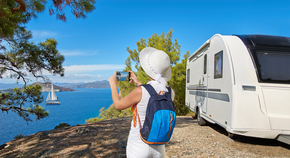 Caravan,Or,Towed,Trailer,On,Seaside,Background.,Female,,Girl,,Or