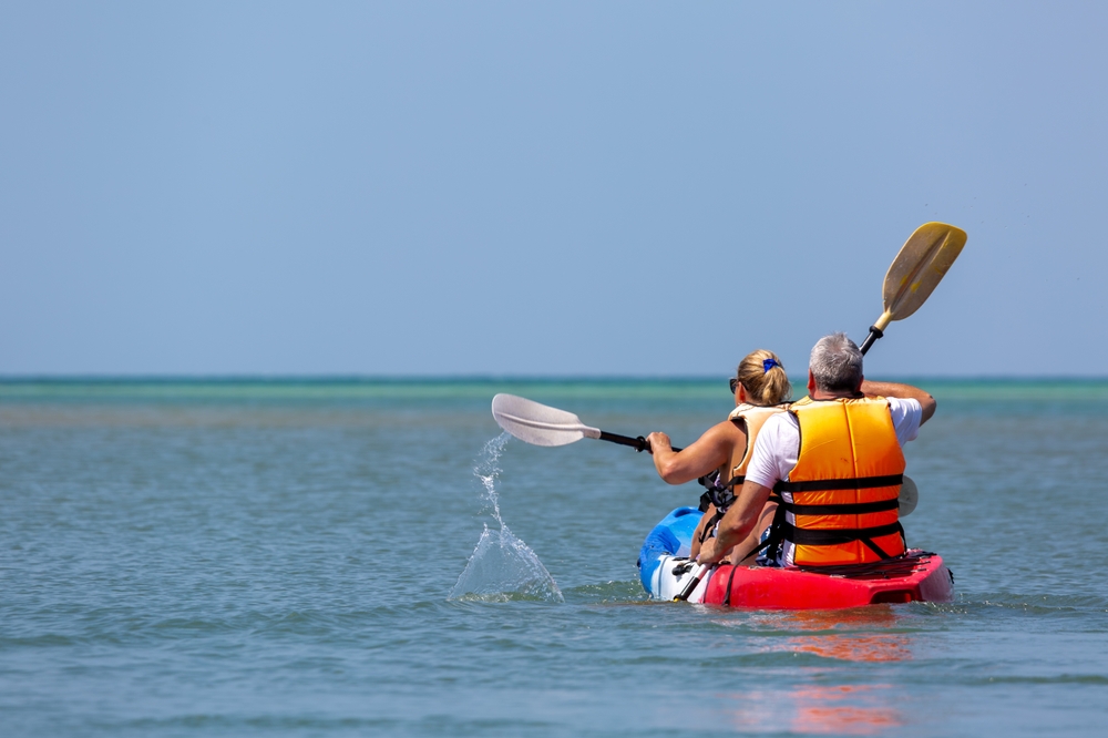 Middle,Aged,Couple,Kayaking,In,Thailand,,Image,Shows,The,Back