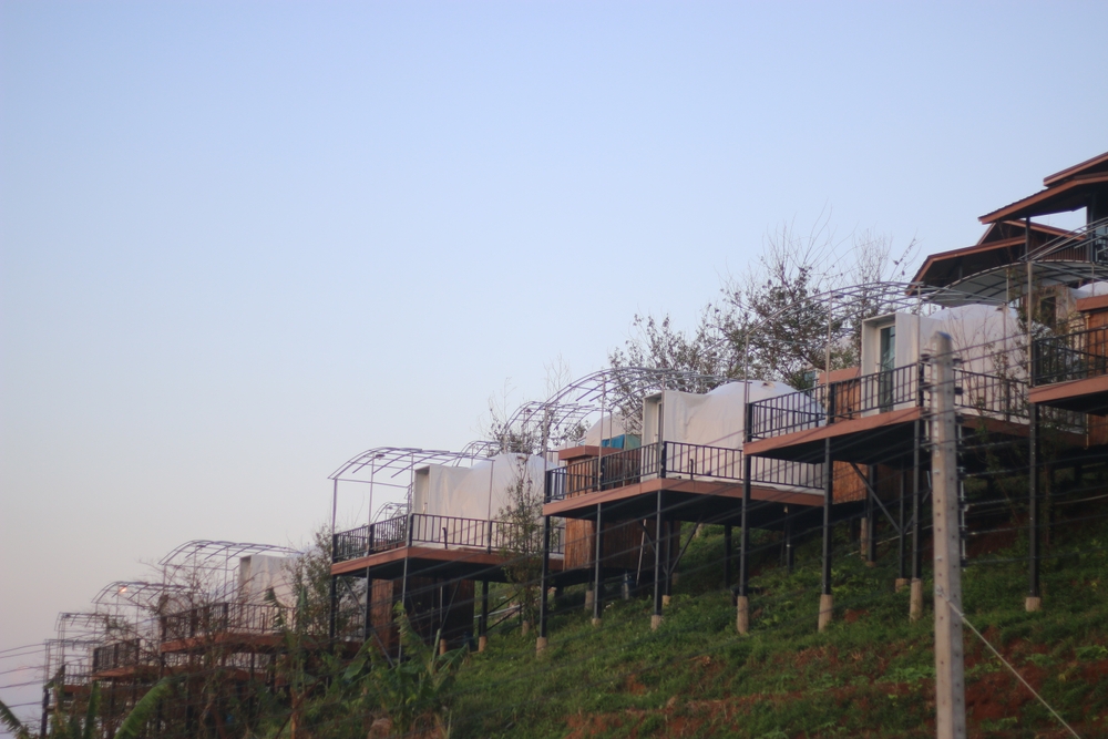 Modern,Cabins,Perched,On,The,Steep,Hillside,,Offering,A,Unique